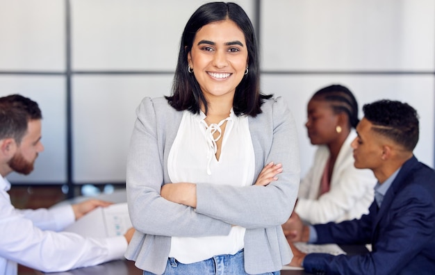 Unafraid and goal bound Shot of a young businesswoman in the middle of a meeting