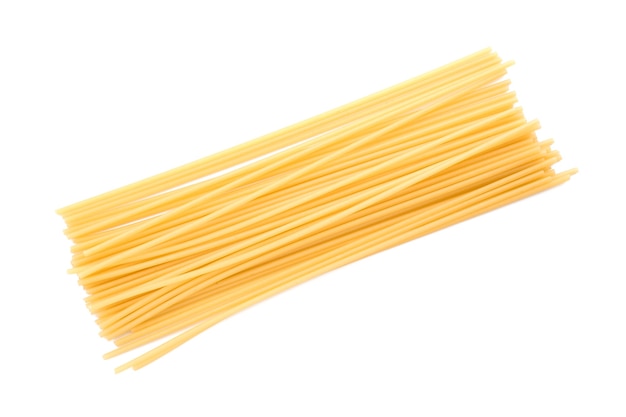 Uncooked pasta on white