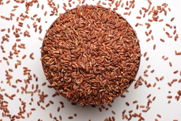 Uncooked Red Rice Wallpaper. Long Brown Rice Surface. Close Up. Grain stack. World crisis, export