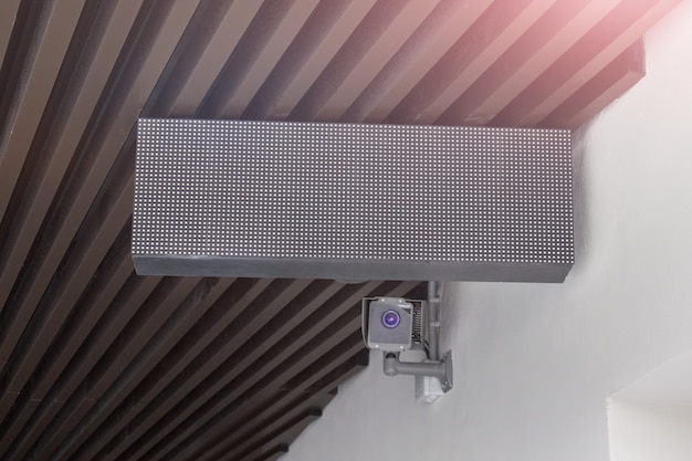 Underground light message board with video surveillance camera