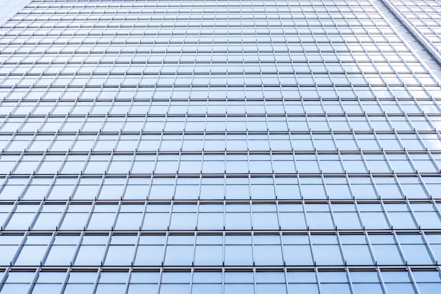 Underside panoramic and perspective view to steel blue glass high rise building skyscrapers, business concept of successful industrial architecture