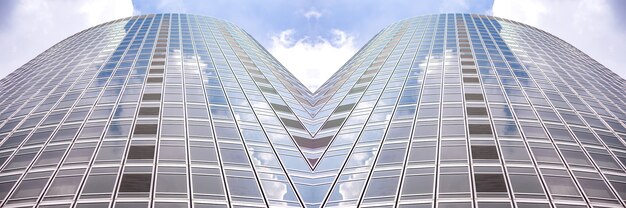 Underside panoramic and perspective view to steel blue glass high rise building skyscrapers, business concept of successful industrial architecture