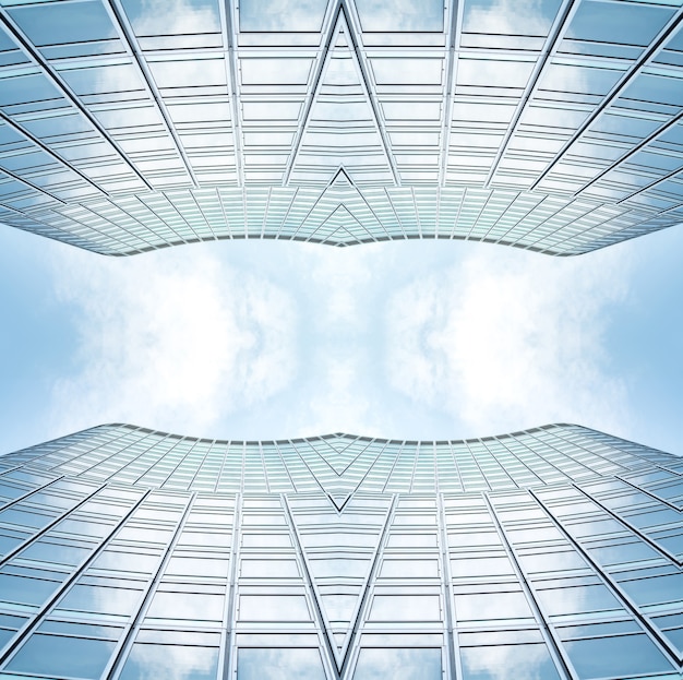 Underside panoramic and perspective view to steel blue glass high rise building skyscrapers, business concept of successful industrial architecture