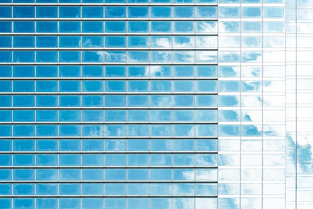 Underside panoramic and perspective view to steel blue glass high rise building skyscrapers