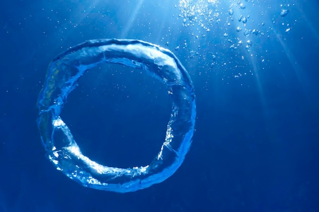 Underwater Bubble Ring Ascends towards the Sun