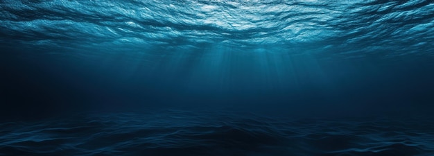 Photo underwater view of sunbeams shining through ocean waves