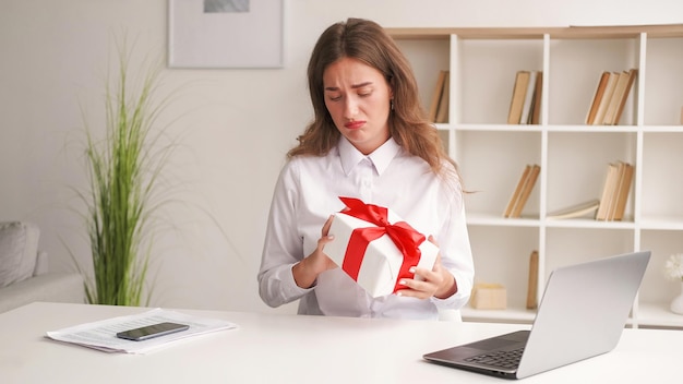 Undesirable gift upset woman corporate greeting