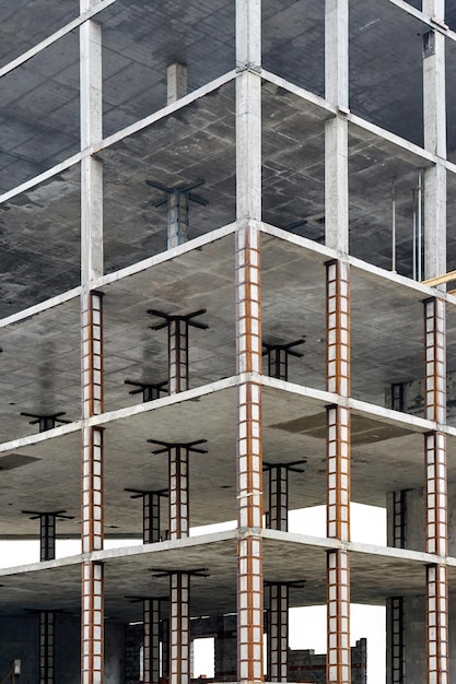 Unfinished monolithic construction of multistory apartment building Reinforced concrete house frame