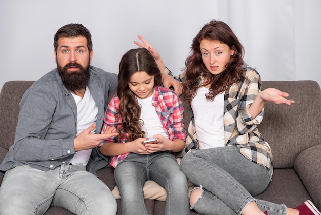 Unhappy parents complain on daughter spending much time on smartphone child