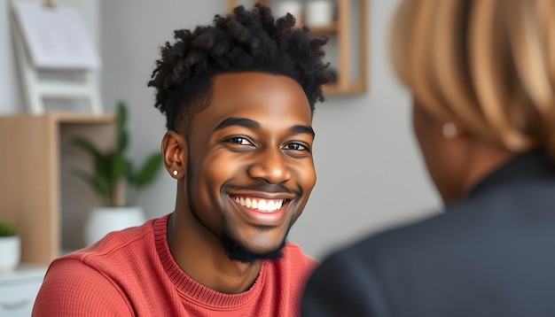 Unhappy young black man having session with professional psychologist at mental health clinic