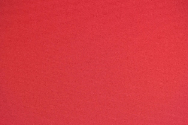 Unicolorous bright red textile as background