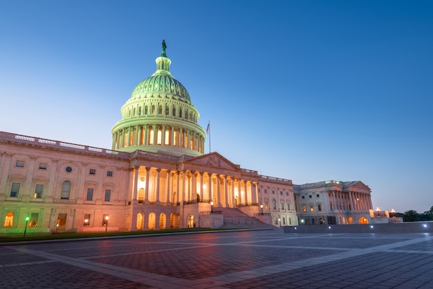 The United States Capitol building at night in Washington DC, United States of America