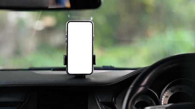 Universal mount holder with smart phone on windshield of automobile for GPS White screen for your advertise text