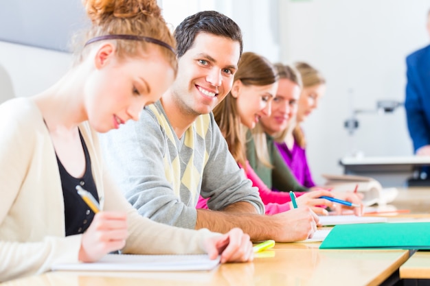 University college students having examination