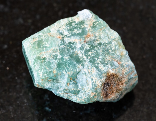 Unpolished Apatite rock on black