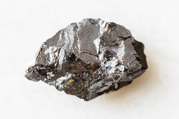 Unpolished Sphalerite zink blende rock on white