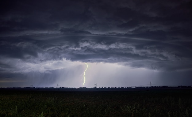 Unrealistically thick clouds and lightning strike into the ground