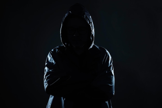 Unrecognizable hacker portrait security and technology crime concept