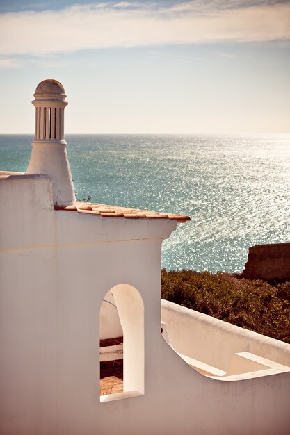 Unrecognizable Part of Residential House on a cliff overlooking the ocean in Portugal