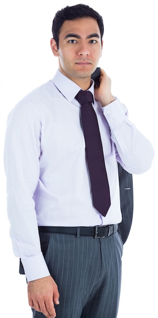 Unsmiling businessman standing