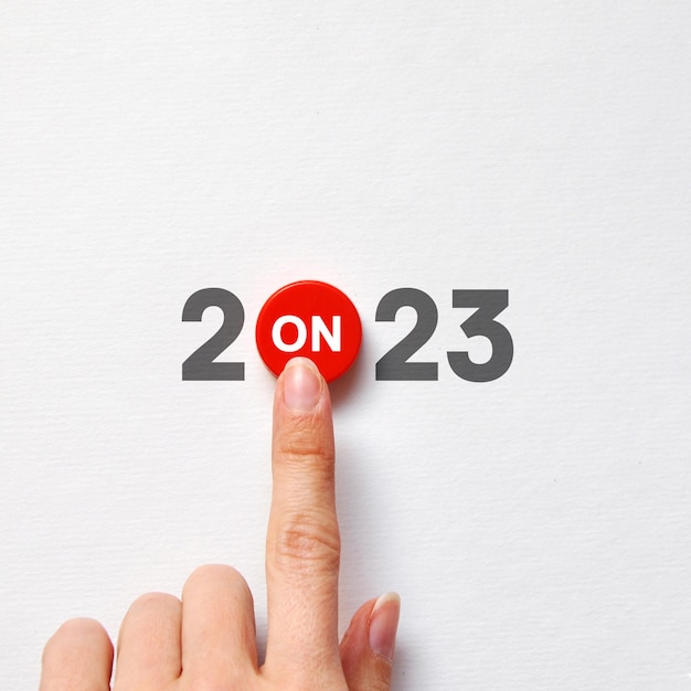 An unusual inscription 2023 with a start button A symbol of the upcoming progressive new year