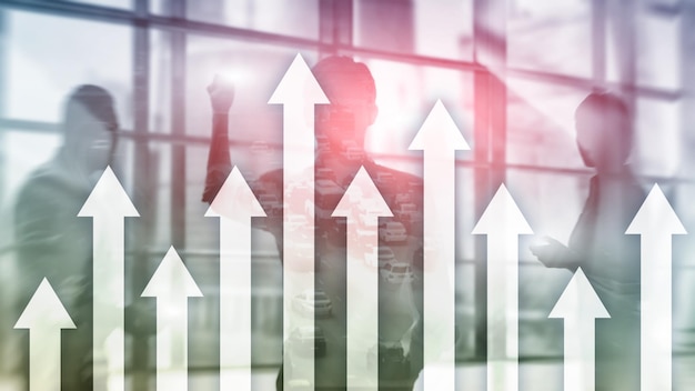 Up arrow graph on skyscraper background Invesment and financial growth concept