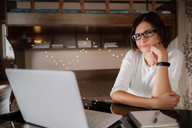 Upset asian woman working from home office