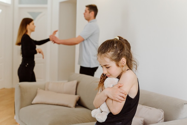 Upset daughter feels sad of parents fighting quarreling