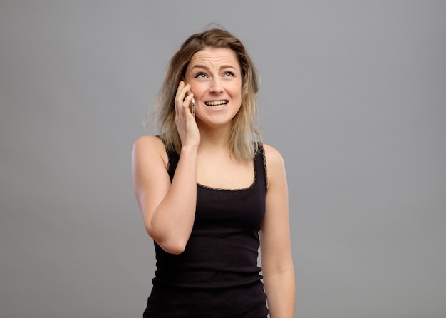 Upset woman screaming on phone