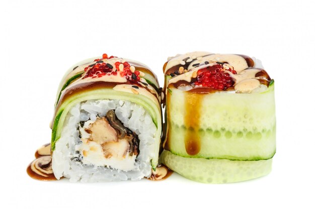 Uramaki maki sushi, two rolls isolated on white