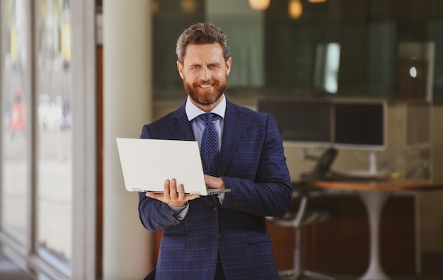 Urban business man smiling casual businessman wearing suit jacket portrait of a mature businessman