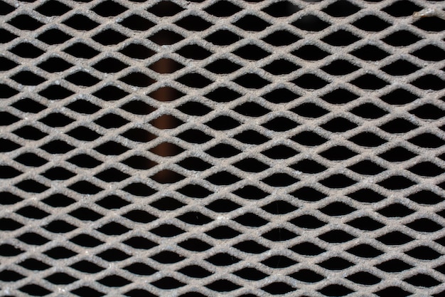 Urban welded metal grid texture as background