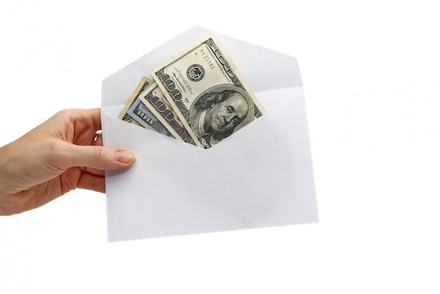 Us dollar banknotes in white envelope on white