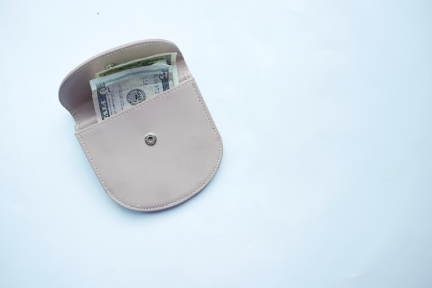 Us dollar cash in leather on white background