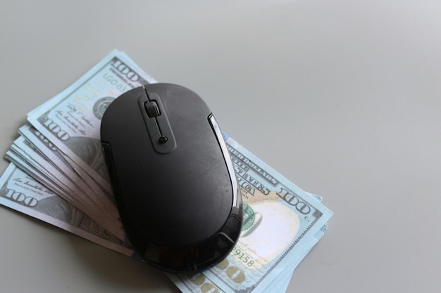 US dollar and computer mouse Pay per click online banking shopping and business concept