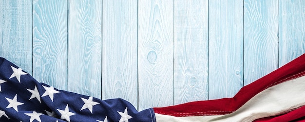 Us flag on blue with white wooden planks texture background