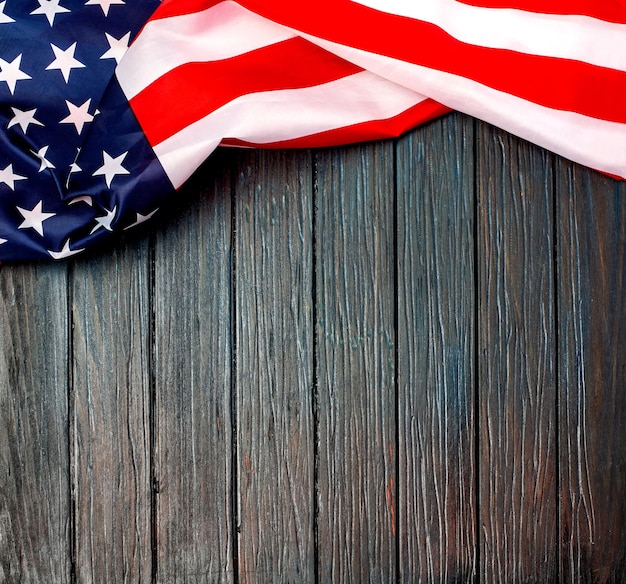 US flag on wooden background