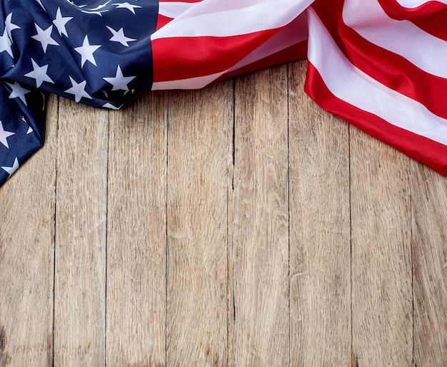 US flag on wooden background