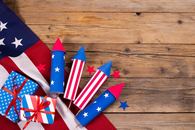 USA independence day celebration patriotism and holidays concept closeup with candy flag and stars at 4th of july party from above on wooden background