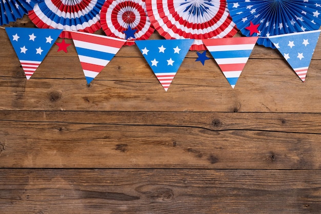 USA independence day celebration patriotism and holidays concept closeup with candy flag and stars at 4th of july party from above on wooden background