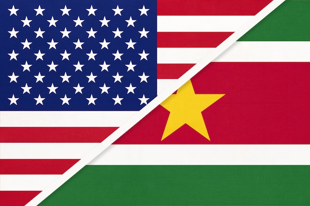 USA vs Surinam national flag. Relationship between two countries.