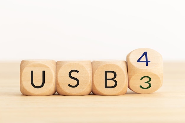 USB 3 to USB 4 change concept Flip Wooden blocks with text Copy space