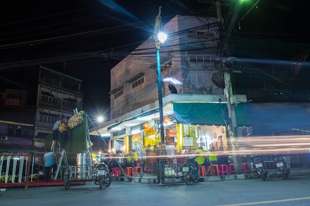 Uthai Thani, Thailand - December 30, 2018:  Old building and waiking street in Uthai Thani, Thailand at night