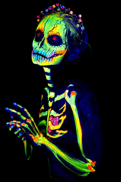 UV body art painting of Halloween female skeleton