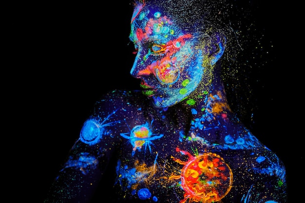 UV painting of a universe on a female body portrait