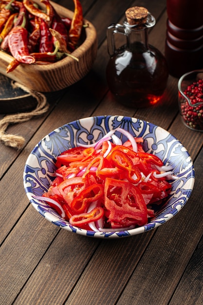 Uzbek achichuk salad with tomatoes and pepper