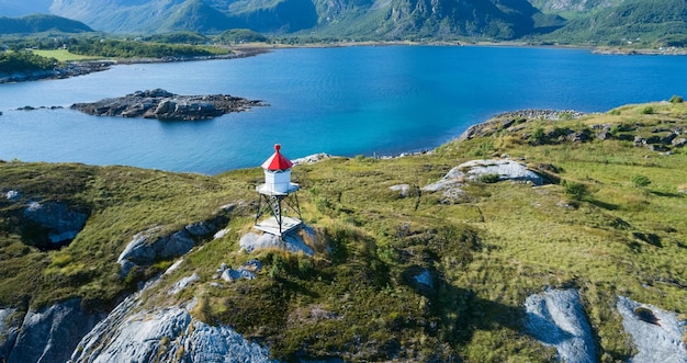 Vacation travel concept with aerial view of the lighthouse on Norway island