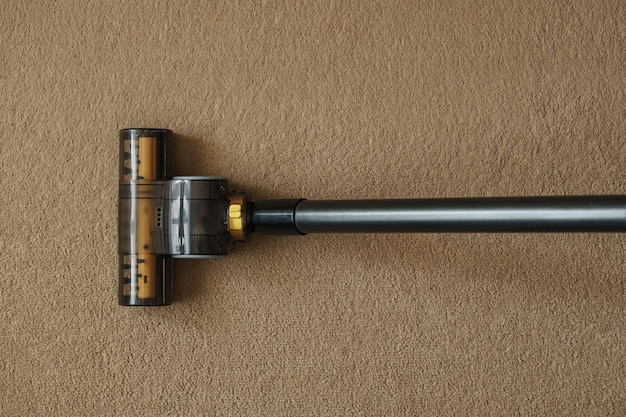 Vacuum cleane nozzle on the carpet