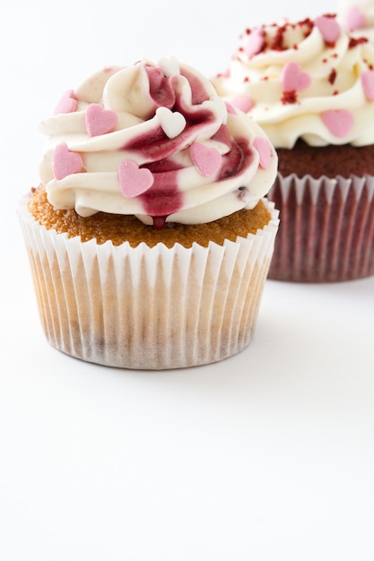 Valentine cupcakes decorated with sweet hearts on white