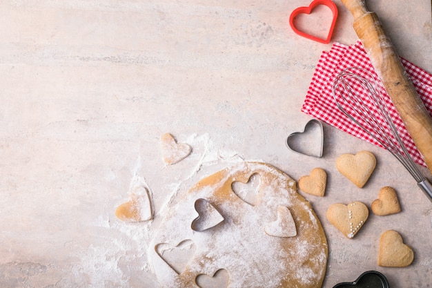 Valentine day baking background. Ingredients for cooking Valentine's heart.  Top view copy space.